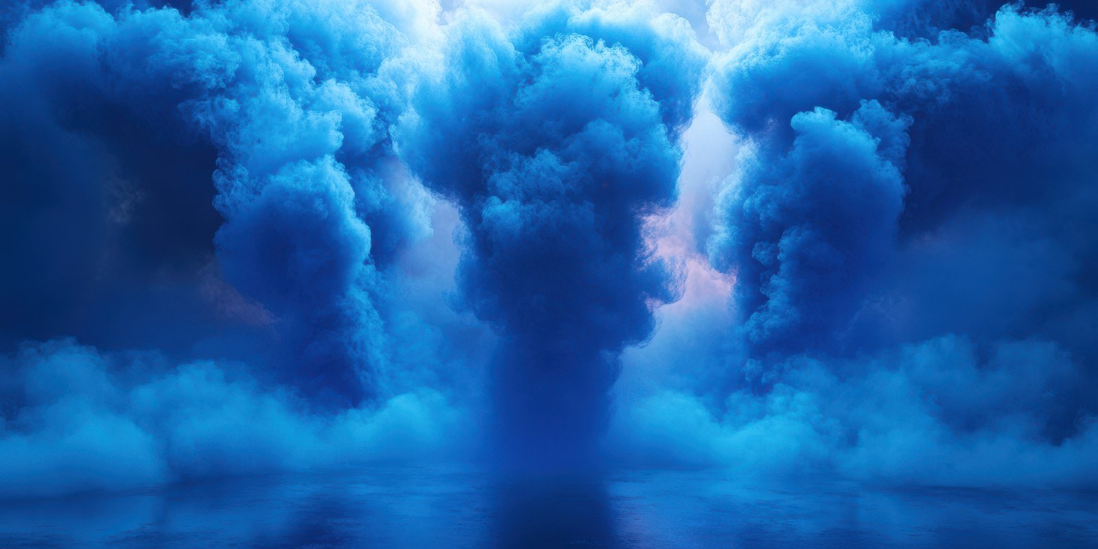 Blue clouds swirl dramatically over a reflective surface during twilight, creating an ethereal atmosphere